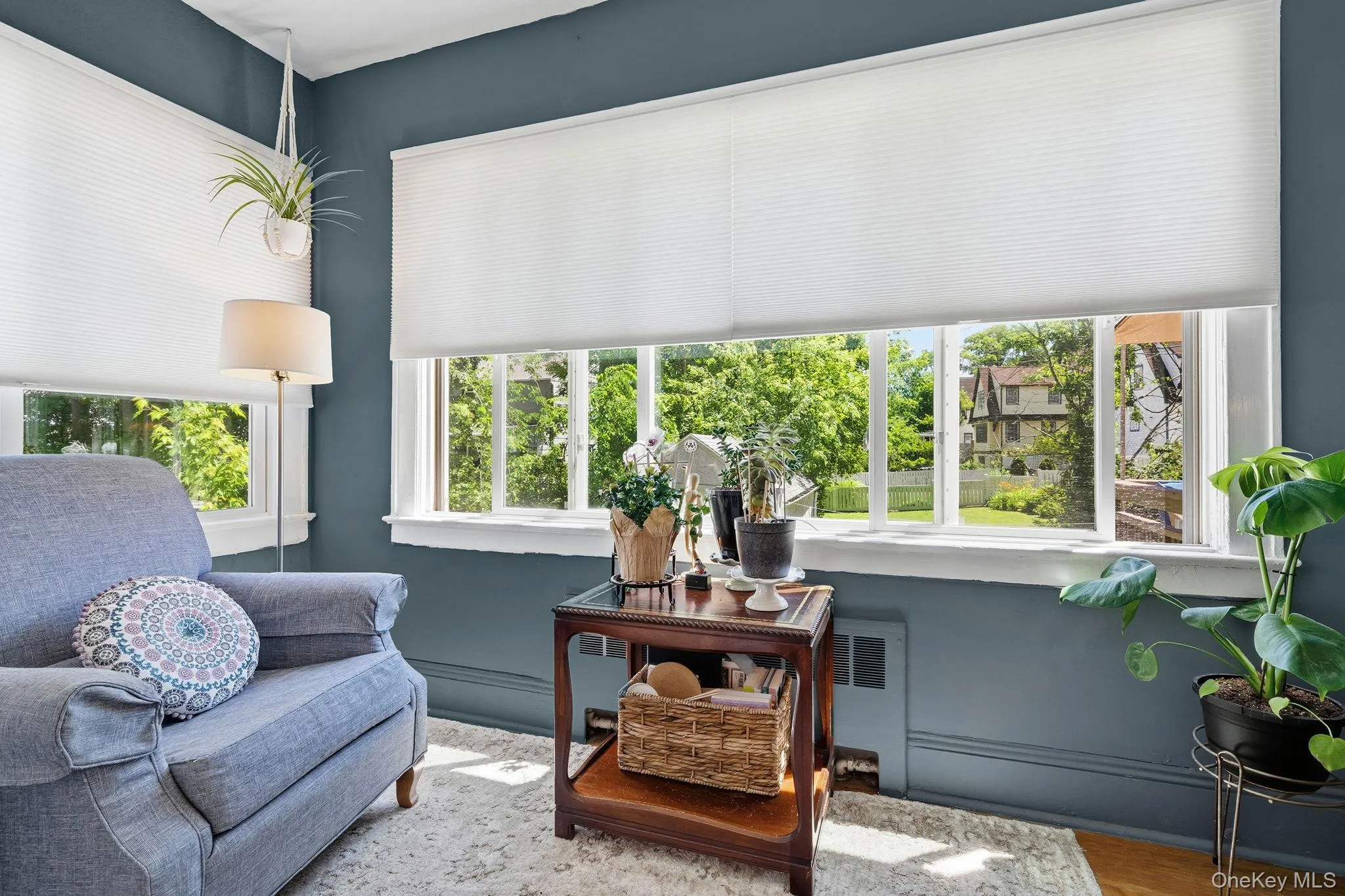 Wrapped in calming blue tones and flooded with natural light, this sunroom offers a serene escape that feels both refreshing and timeless. Wrapped in calming blue tones and flooded with natural light, this sunroom offers a serene escape that feels both refreshing and timeless.