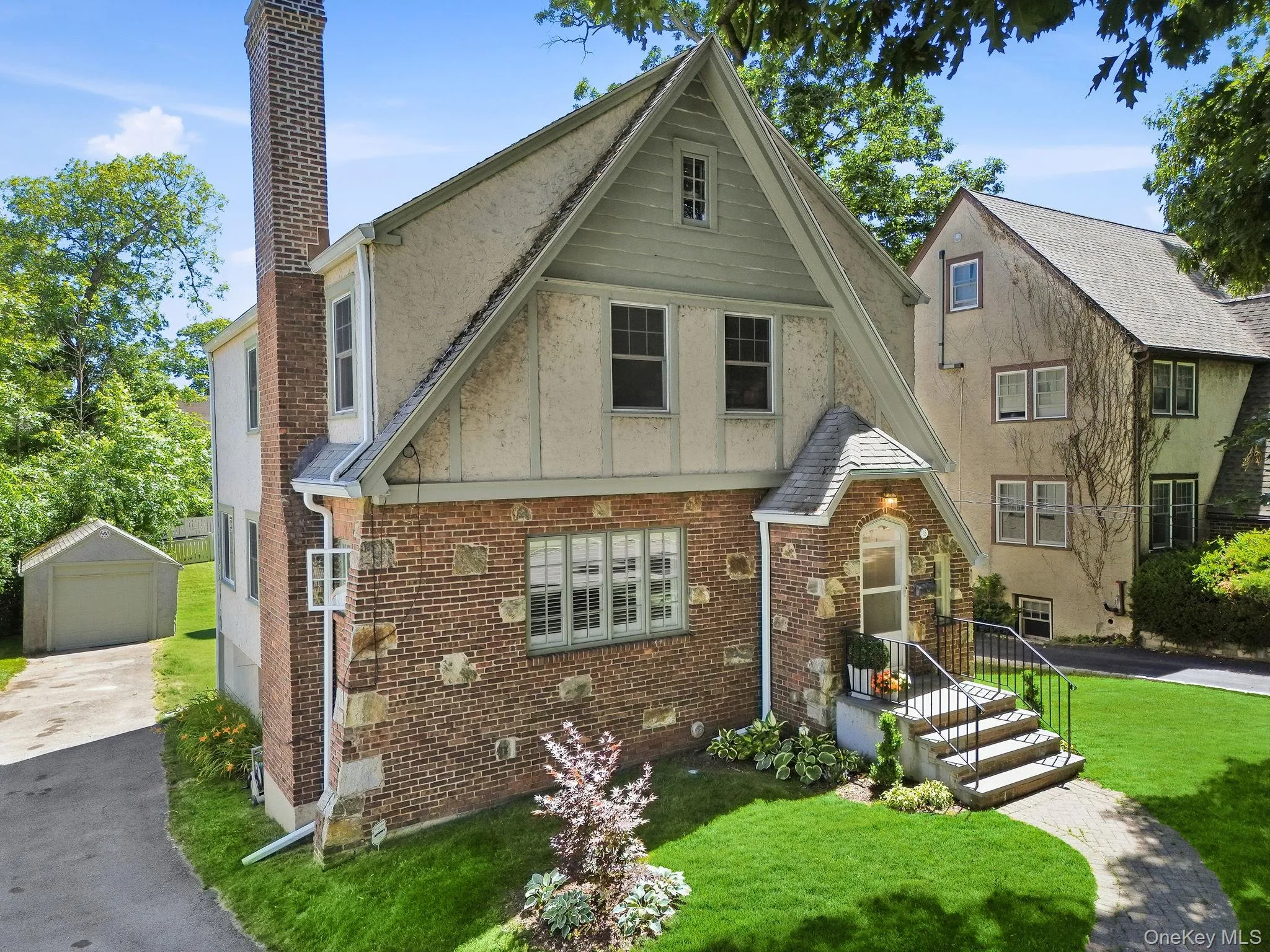 A timeless Tudor where classic architecture meets unforgettable curb appeal. A timeless Tudor where classic architecture meets unforgettable curb appeal.