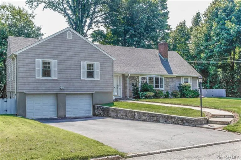 Attached 2 car garage and large driveway parking. Attached 2 car garage and large driveway parking.