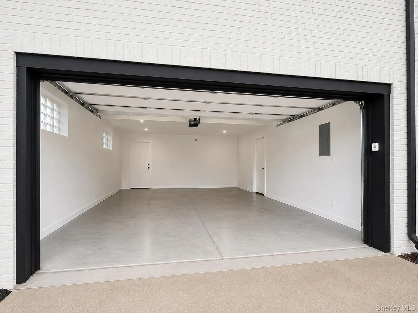 Two Car Garage with entrance into the Fully Finished Basement. Two Car Garage with entrance into the Fully Finished Basement.