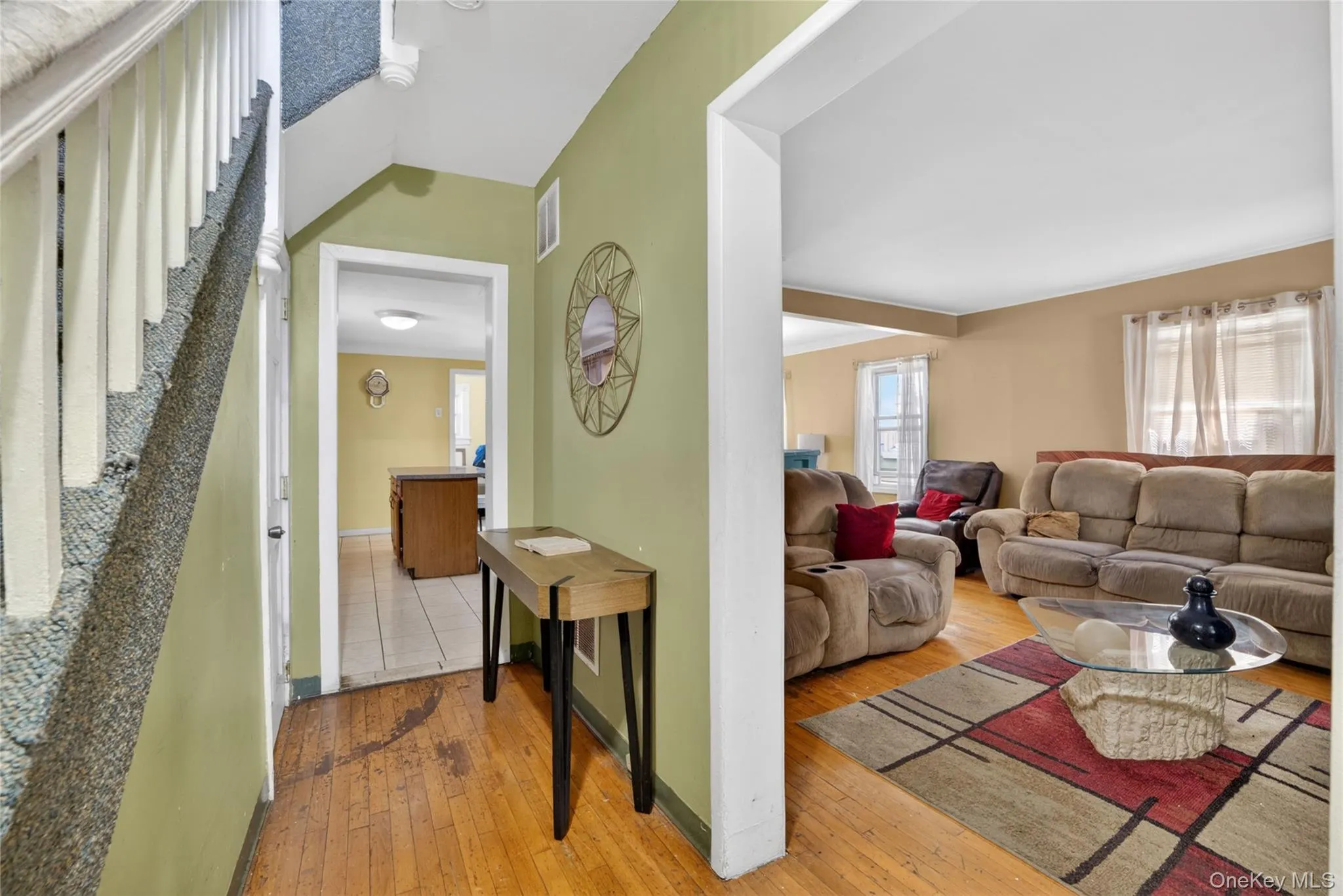 Enter into generous hallway and side hall colonial stairs Enter into generous hallway and side hall colonial stairs