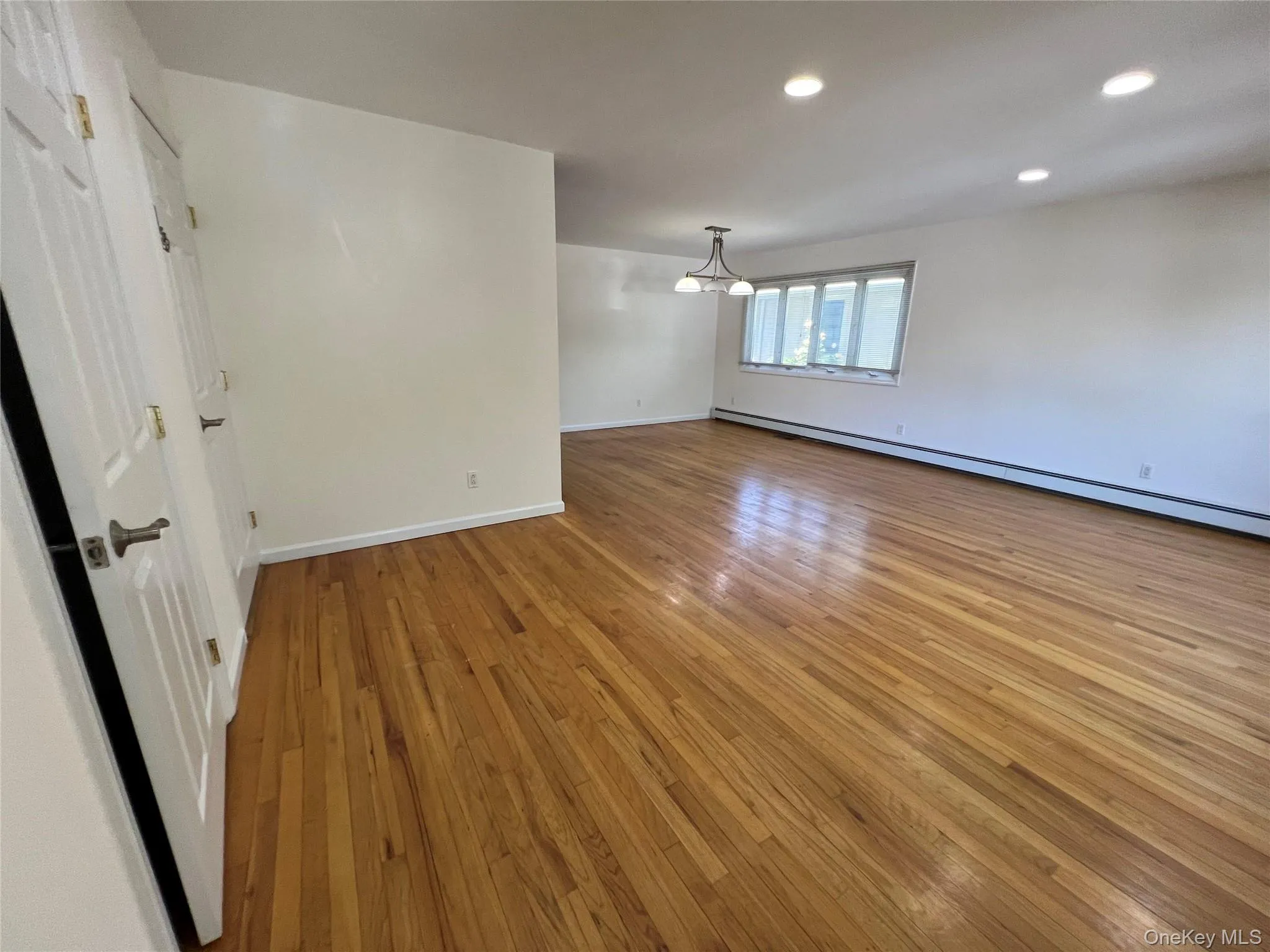 Basement door located on the left near the coat closet.. Basement door located on the left near the coat closet..