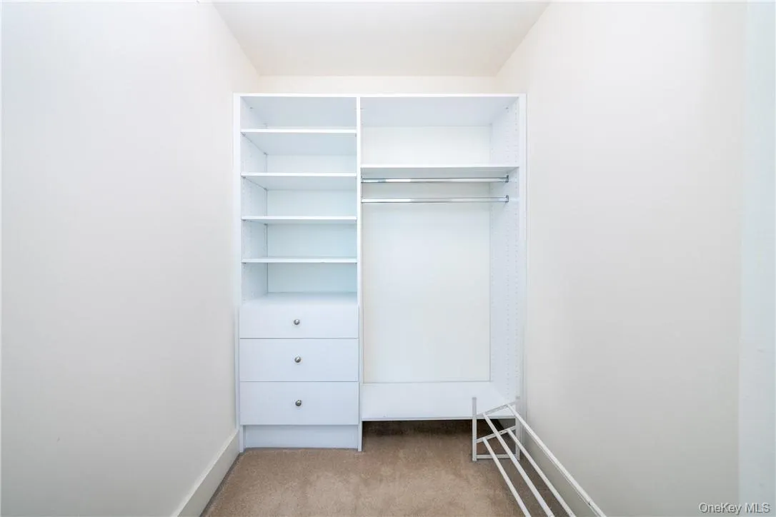 Primary bedroom walk in closet Primary bedroom walk in closet