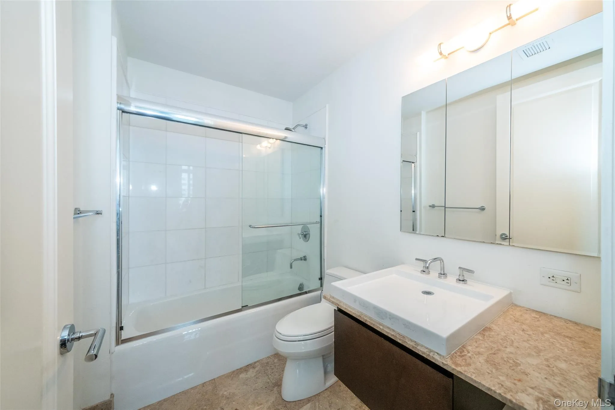 Hall Bathroom with vanity and enclosed tub / shower combo Hall Bathroom with vanity and enclosed tub / shower combo