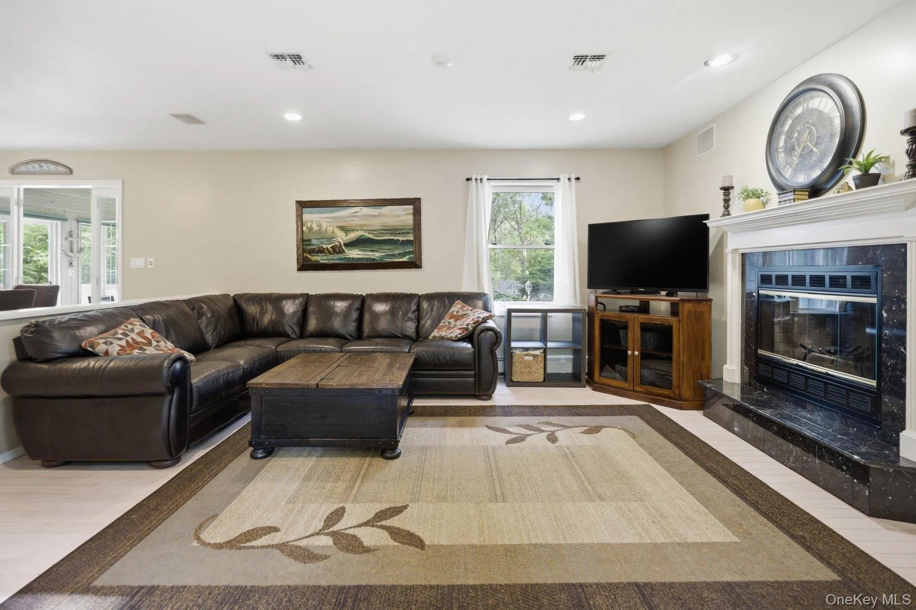 Family Room with wood-burning Fireplace Family Room with wood-burning Fireplace