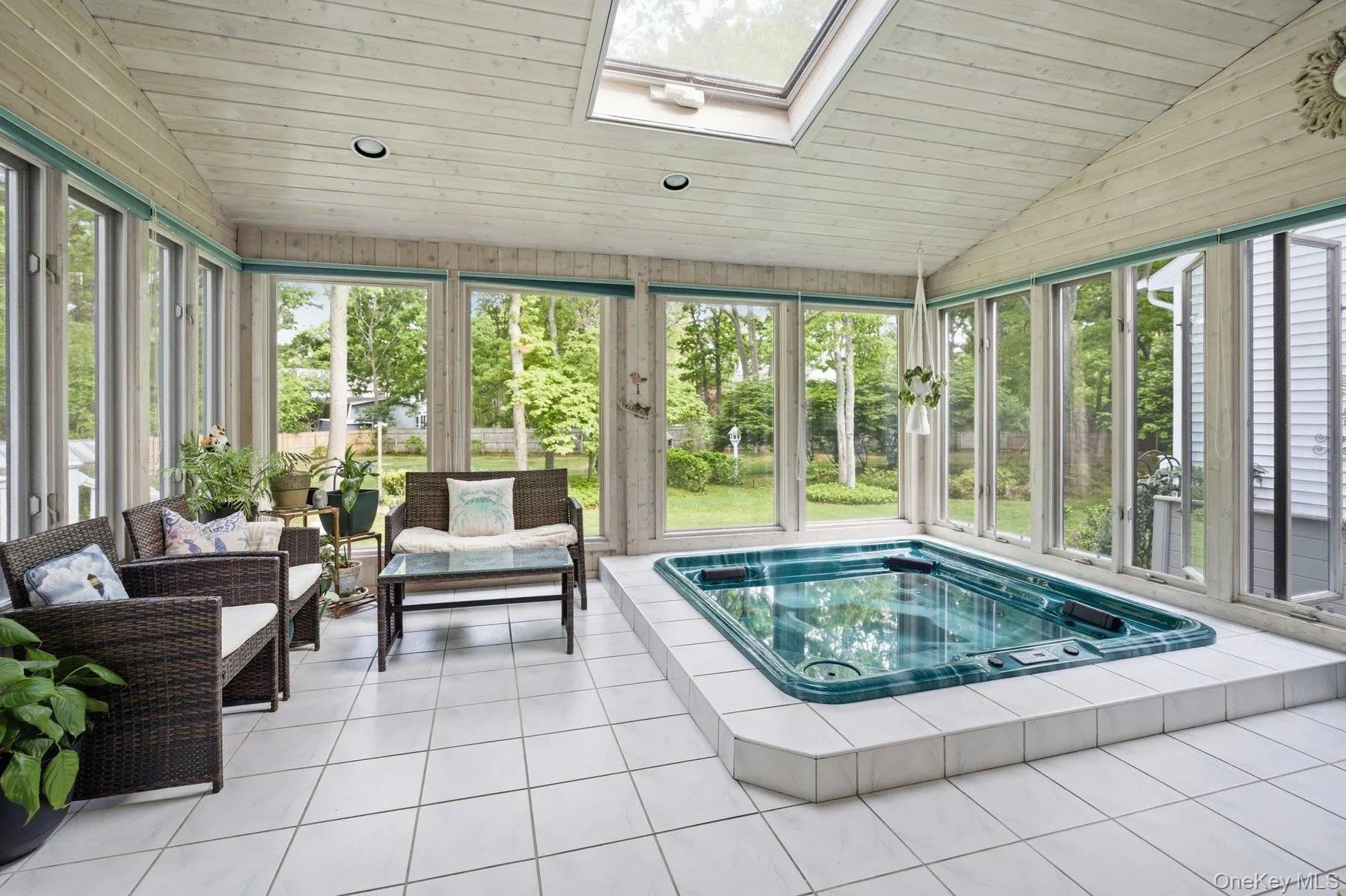 Sun Room with Hot Tub and wall of windows, glass sliders Sun Room with Hot Tub and wall of windows, glass sliders