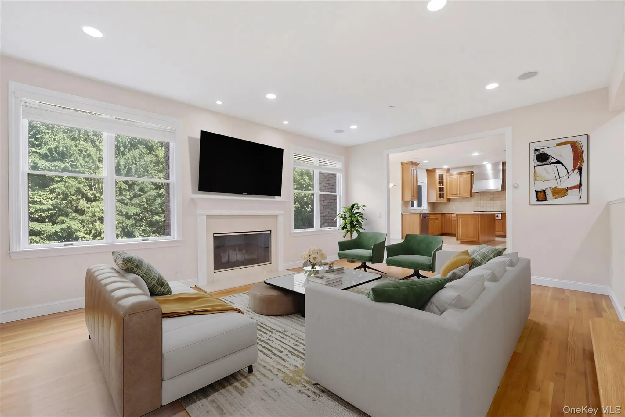 Family room with fireplace—virtually staged Family room with fireplace—virtually staged