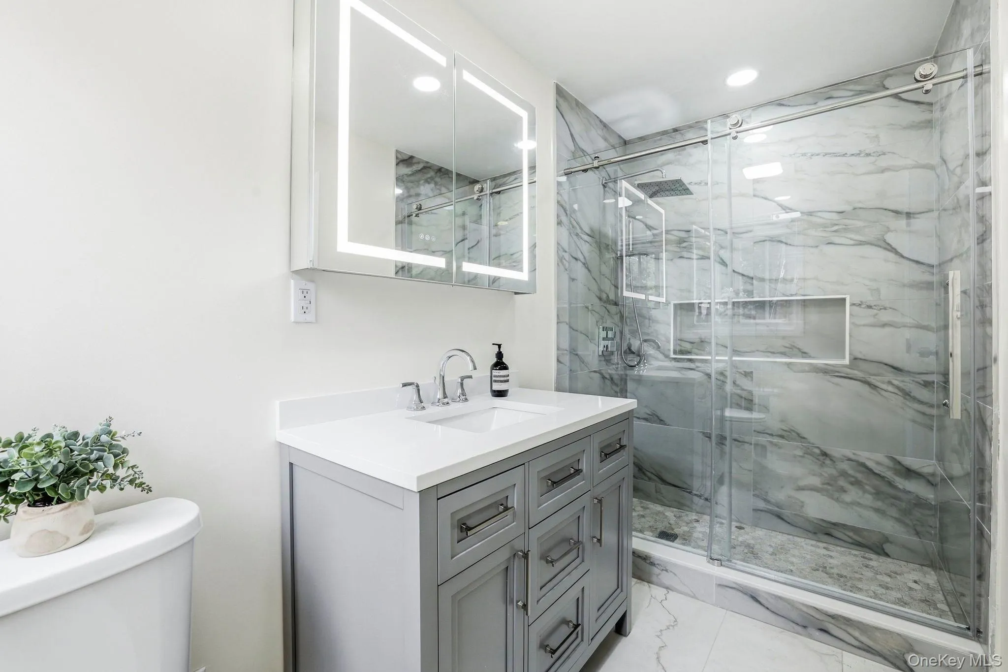 Ensuite primary bedroom with luxury walk-in shower Ensuite primary bedroom with luxury walk-in shower