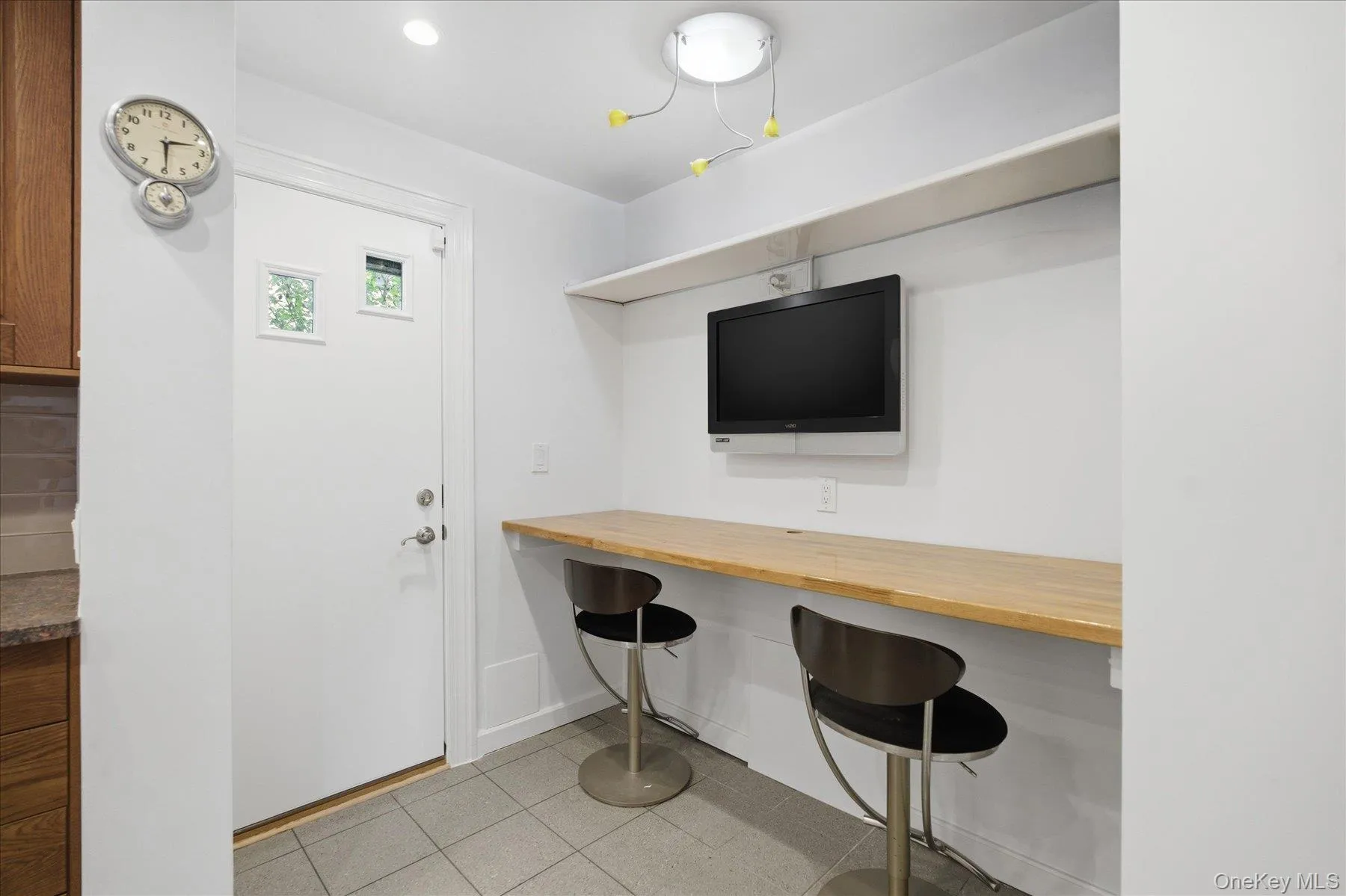 Dining and work area in kitchen and side entrance Dining and work area in kitchen and side entrance