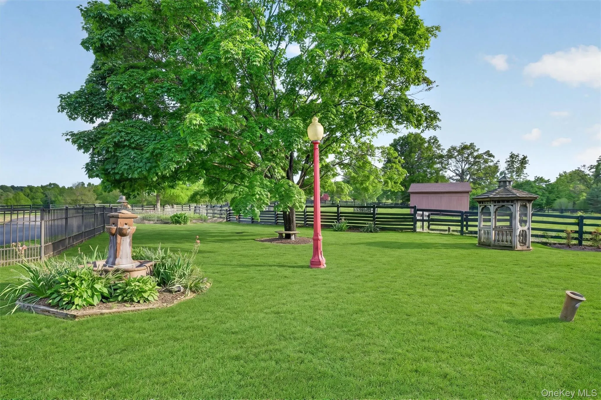 Manicured park-like acres throughout the property Manicured park-like acres throughout the property
