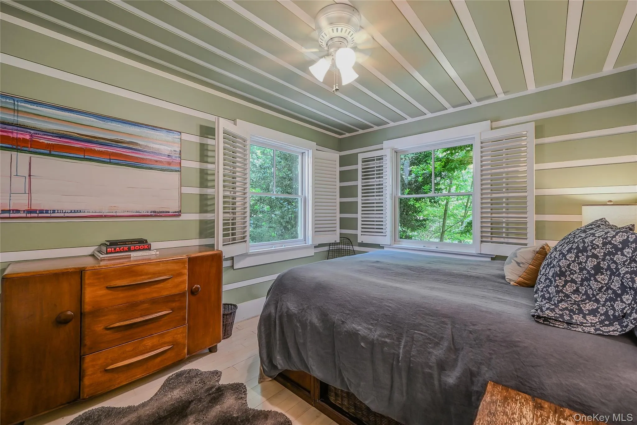 Bedroom featuring light wood-type flooring Bedroom featuring light wood-type flooring