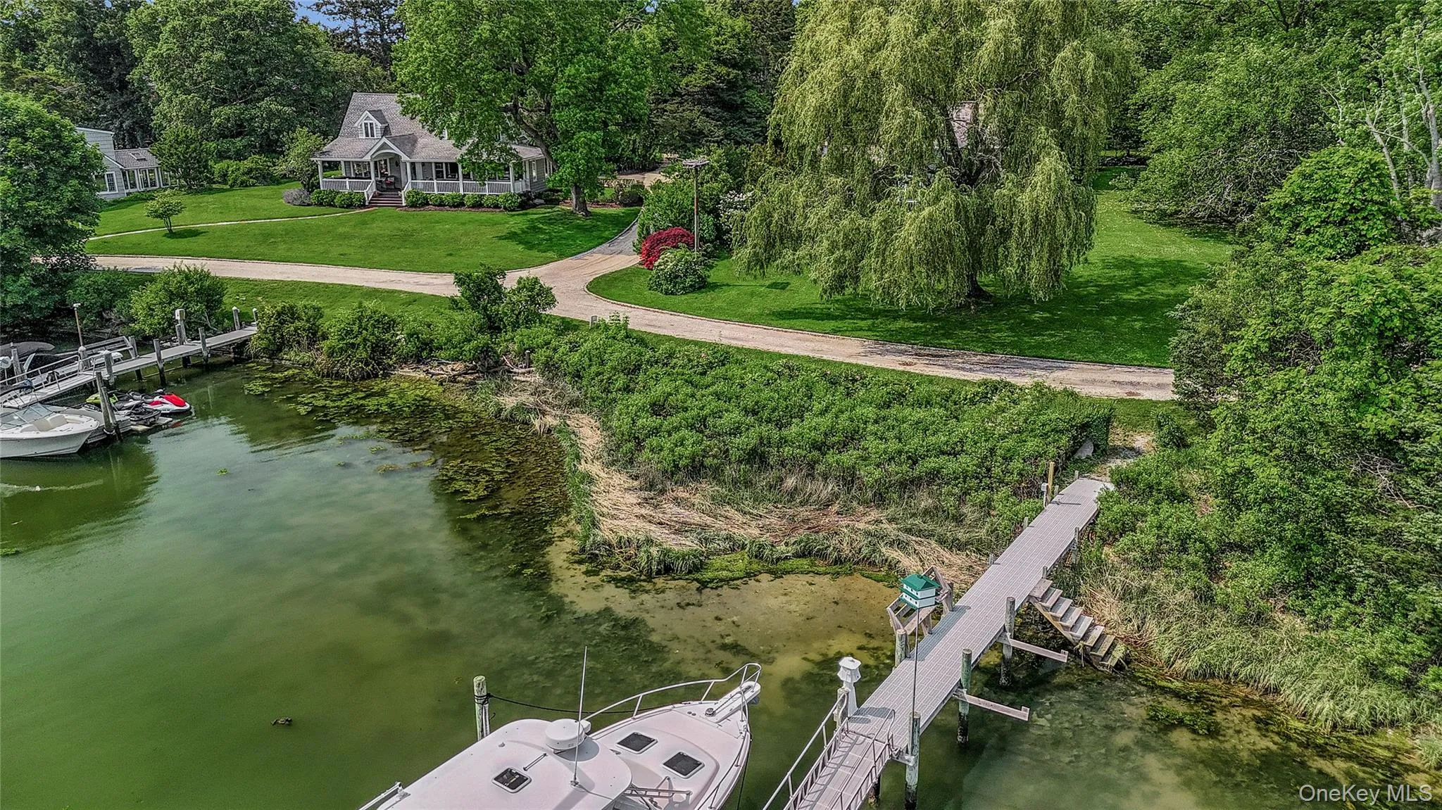 View of subject property with a large body of water View of subject property with a large body of water