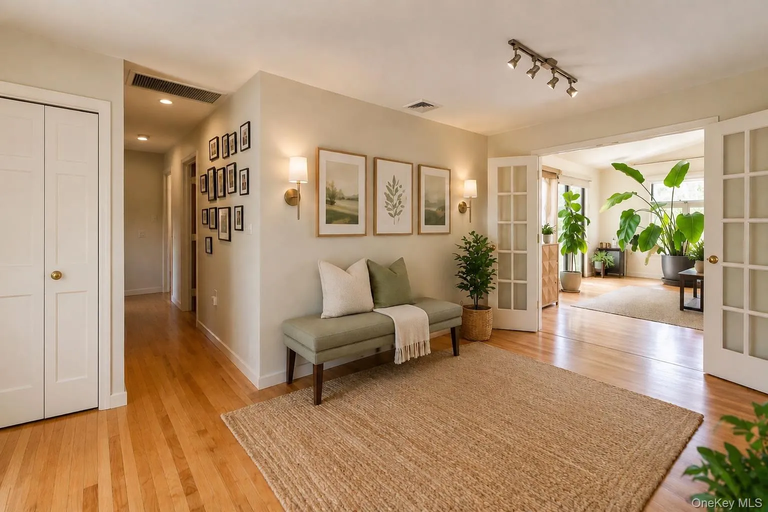 Virtually staged gallery wall sitting area Virtually staged gallery wall sitting area