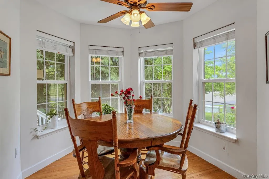 The windows in the breakfast nook shows all the greenery outside. Imagine those trees in the winter time covered with snow and how beautiful they’ll be then. The windows in the breakfast nook shows all the greenery outside. Imagine those trees in the winter time covered with snow and how beautiful they’ll be then.