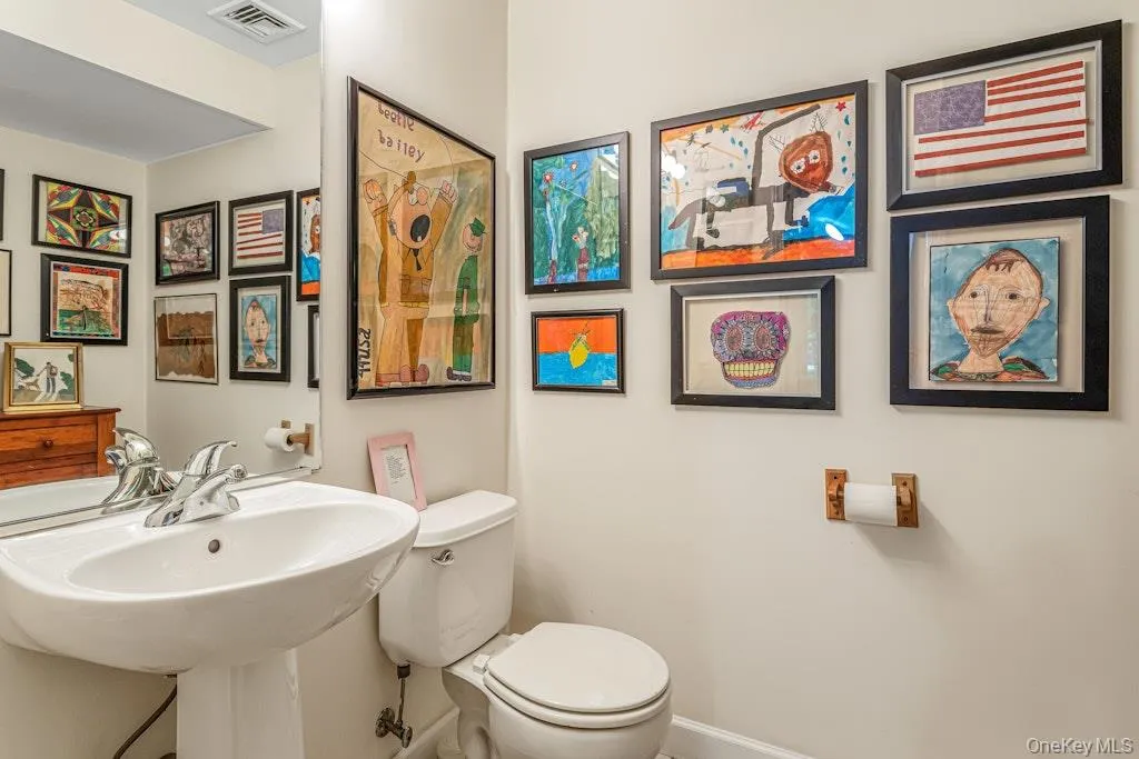 This half bath on the lower level has the ability to be converted into a full bath with either a tub or shower and the necessary plumbing is already built in. This half bath on the lower level has the ability to be converted into a full bath with either a tub or shower and the necessary plumbing is already built in.