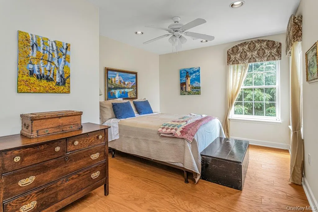 And now, we are up on the second floor in the second bedroom, which is also very spacious and has a view out to the wooded area behind the house which adds to your privacy. And now, we are up on the second floor in the second bedroom, which is also very spacious and has a view out to the wooded area behind the house which adds to your privacy.