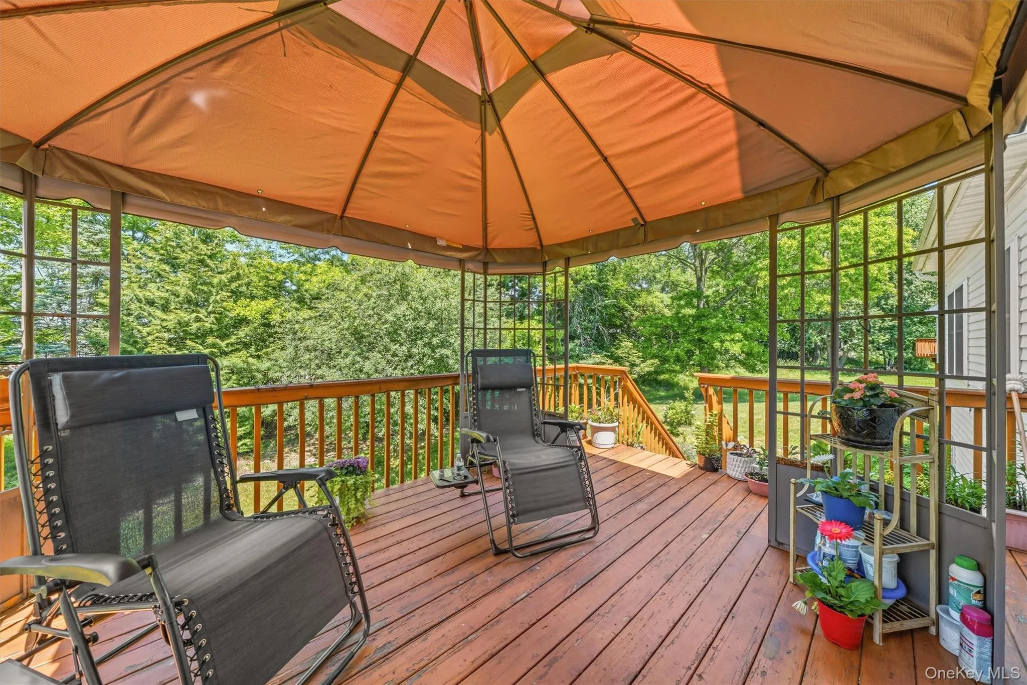 Back Deck with stairs leading to back yard Back Deck with stairs leading to back yard