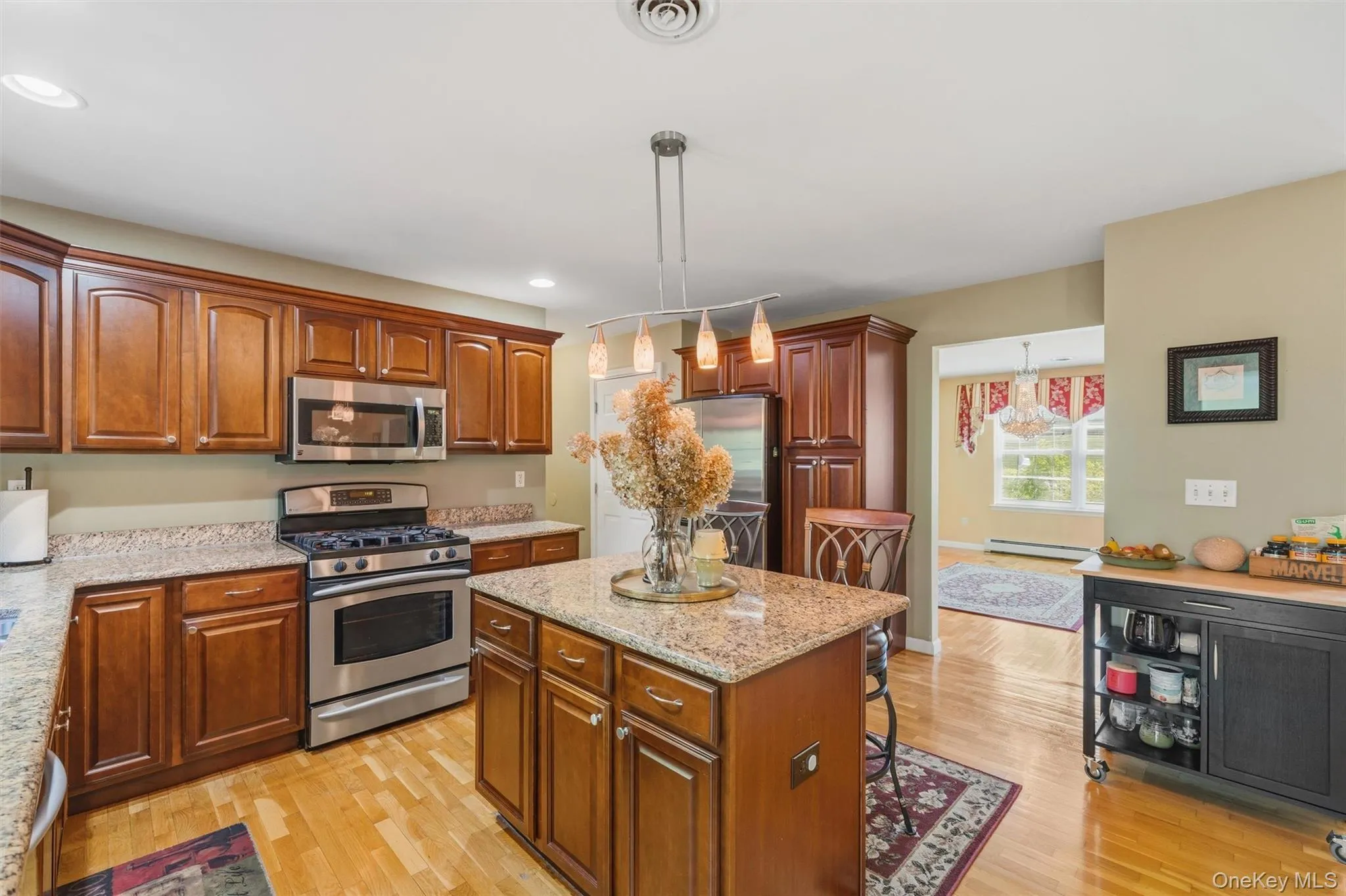 Kitchen opens up to Formal Dining Room Kitchen opens up to Formal Dining Room