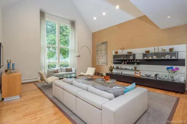 Sunken Living with Cathedral ceilings and panoramic window Sunken Living with Cathedral ceilings and panoramic window