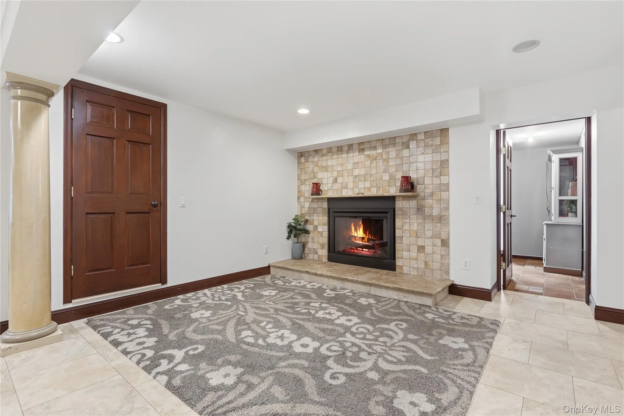 Lower level Family Room with Fireplace Lower level Family Room with Fireplace