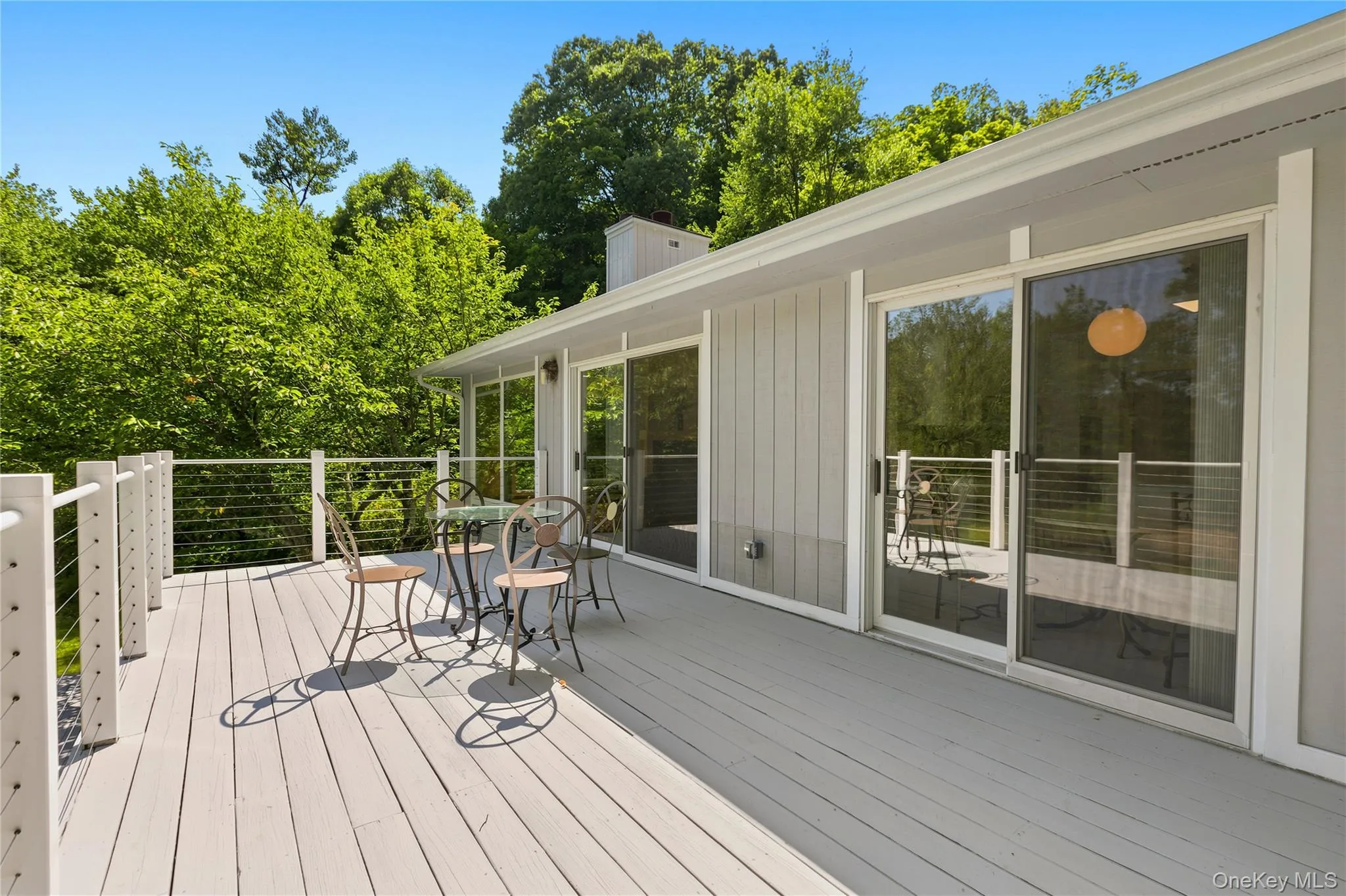 Deck off kitchen and living room Deck off kitchen and living room