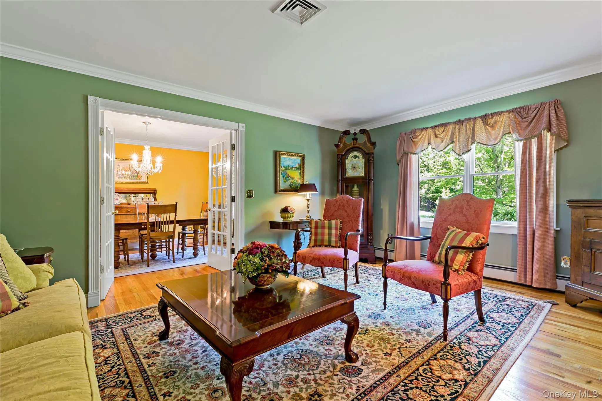 Reading room leads to the formal dining room Reading room leads to the formal dining room