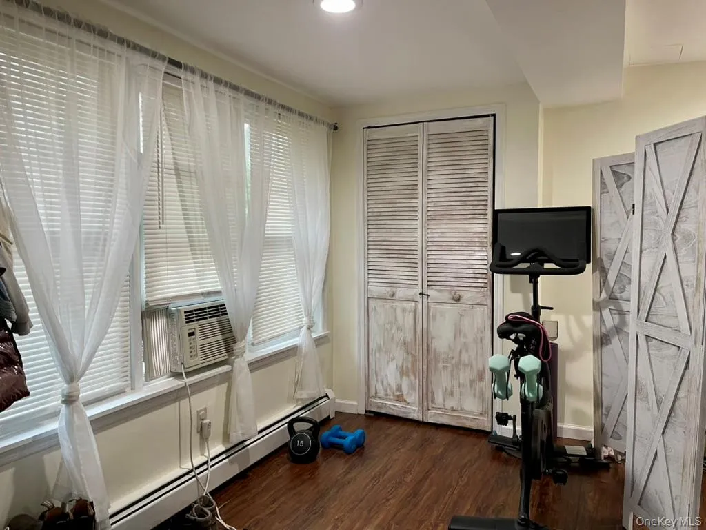 Living area with plenty of windows and sunlight. Living area with plenty of windows and sunlight.
