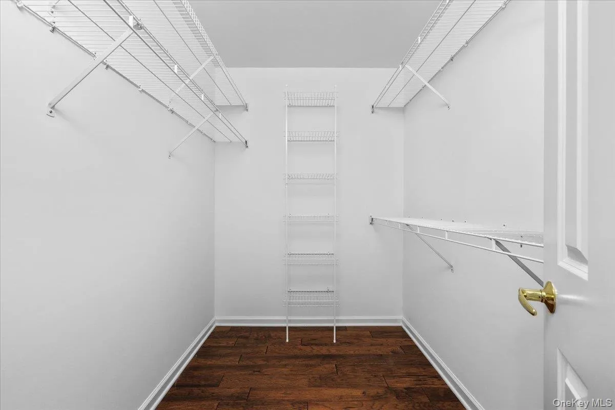 Primary Bedroom Walk in Closet Primary Bedroom Walk in Closet