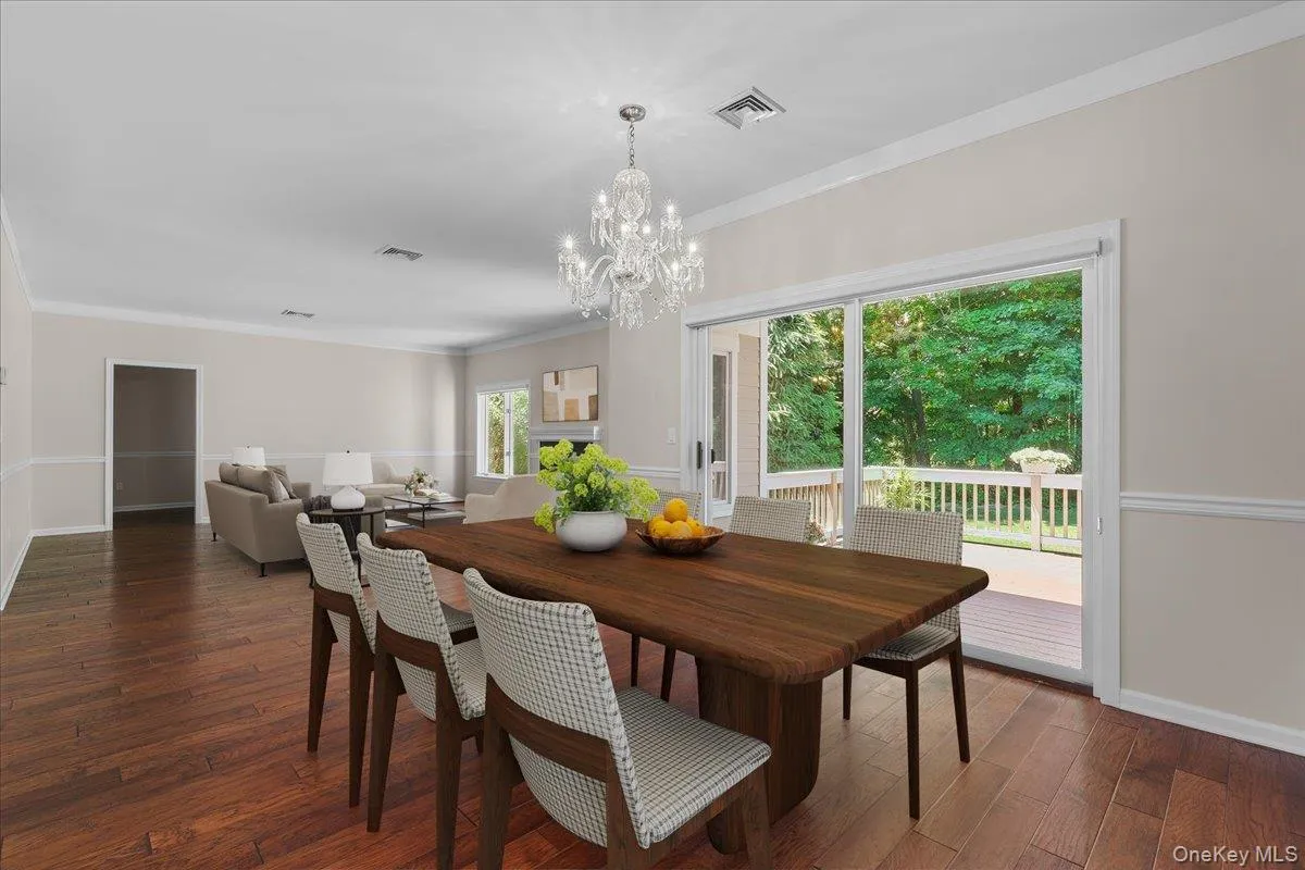 Virtually-staged Dining Room/Living Room Virtually-staged Dining Room/Living Room