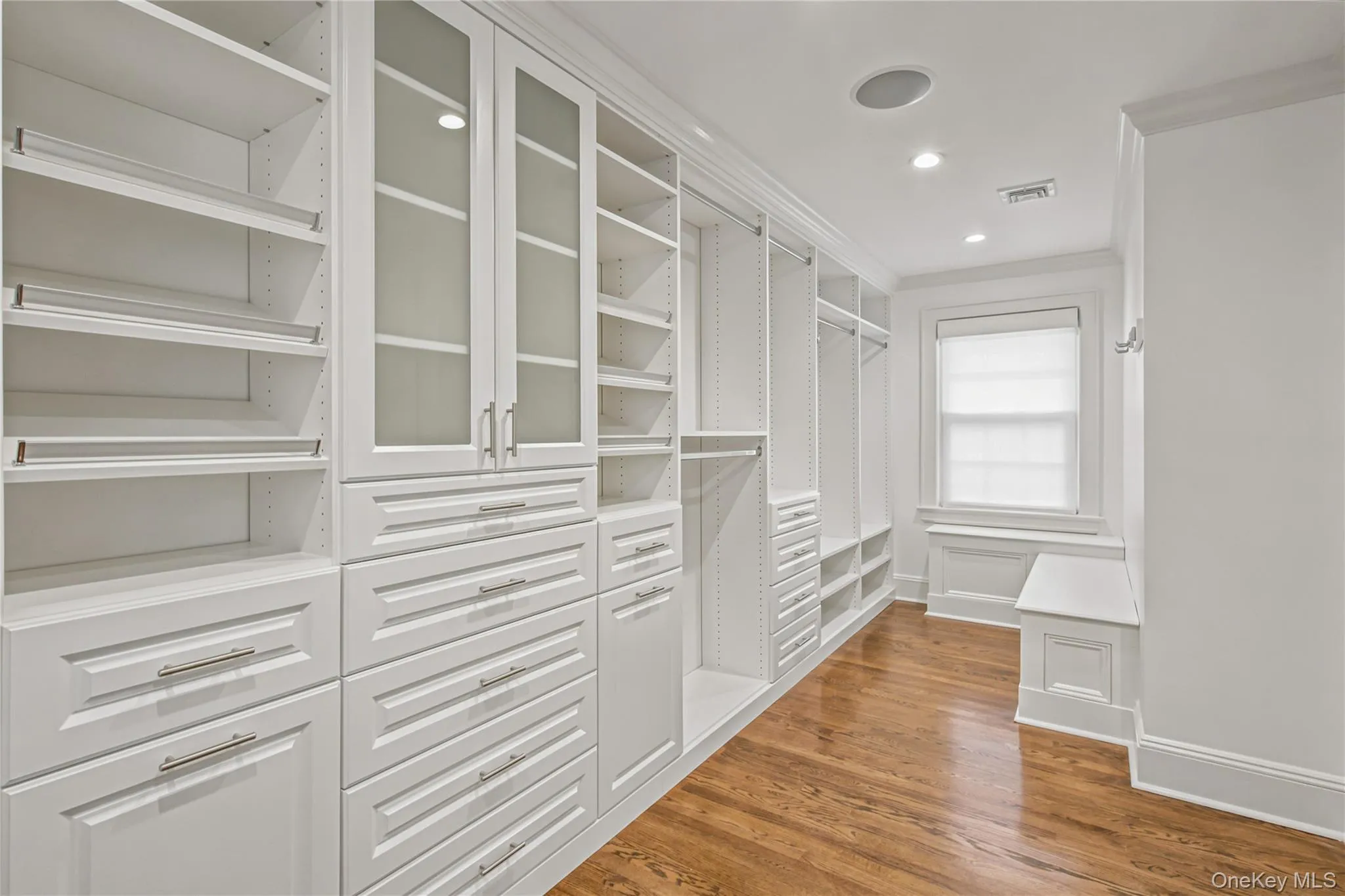 Stunning walk in closet completely customized Stunning walk in closet completely customized
