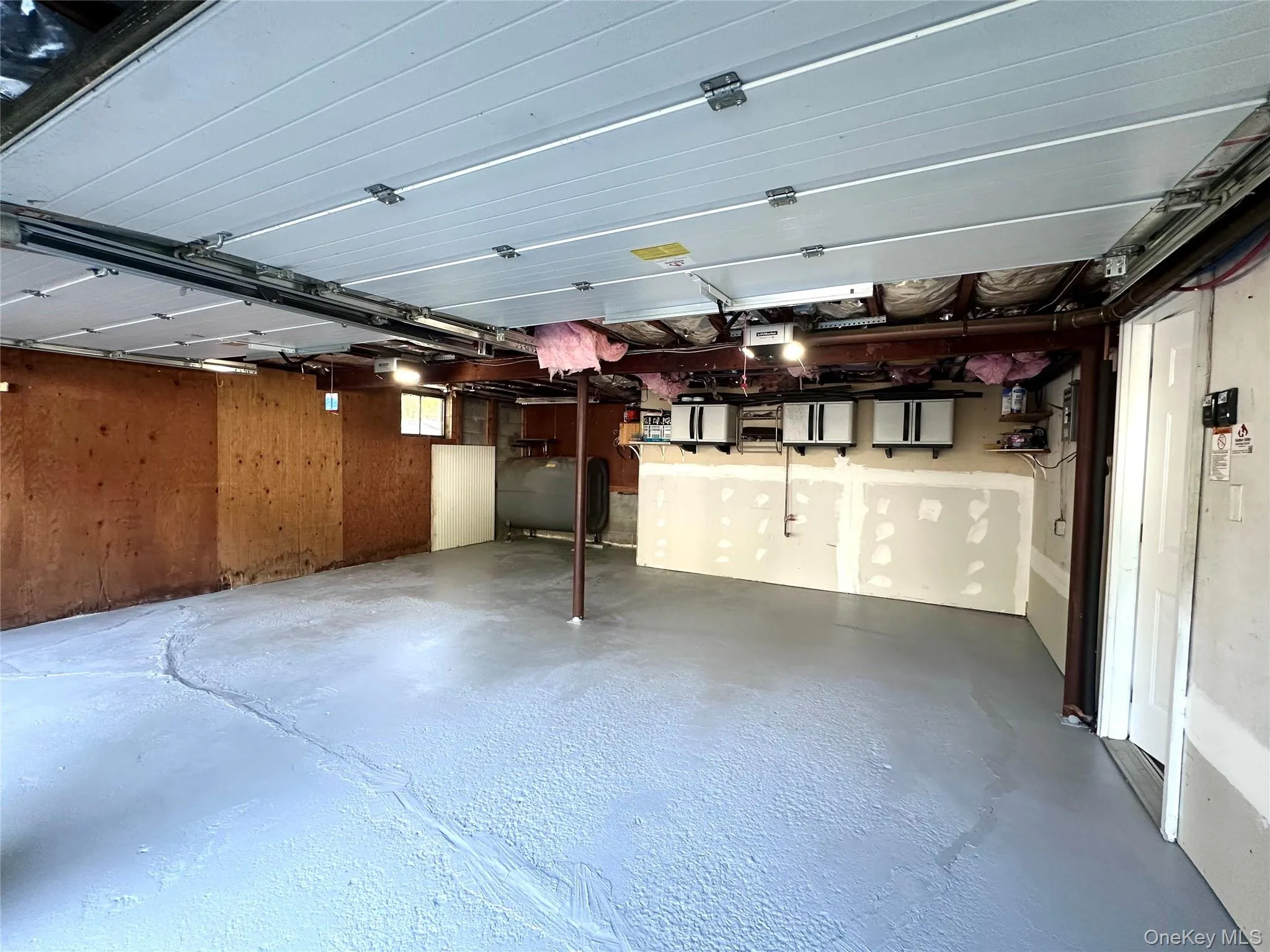 Roomy garage with storage Roomy garage with storage