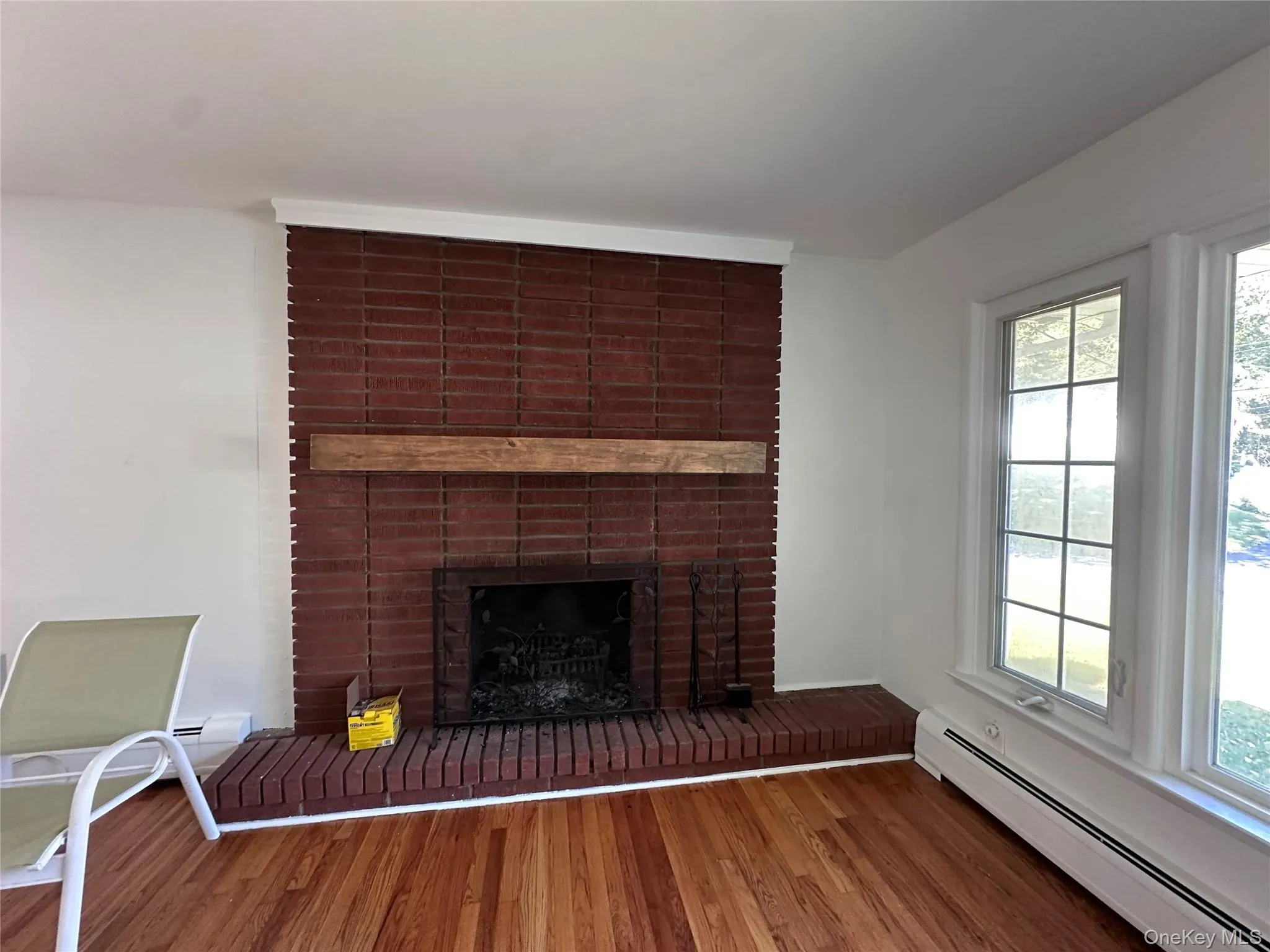 Beautiful wood-burning fireplace in living room Beautiful wood-burning fireplace in living room
