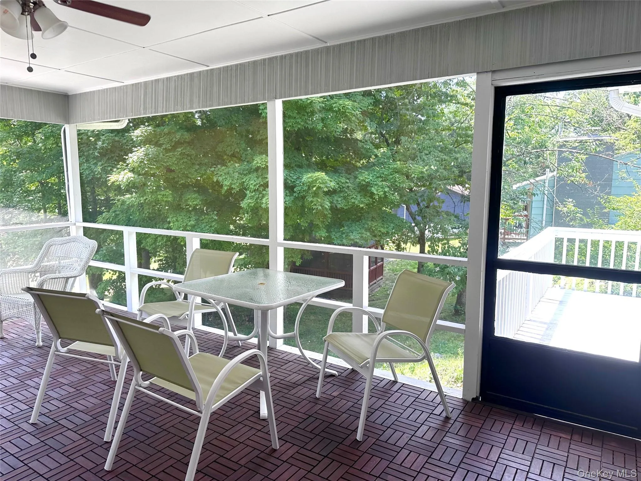 Enjoy your three-season screened in family room. Enjoy your three-season screened in family room.