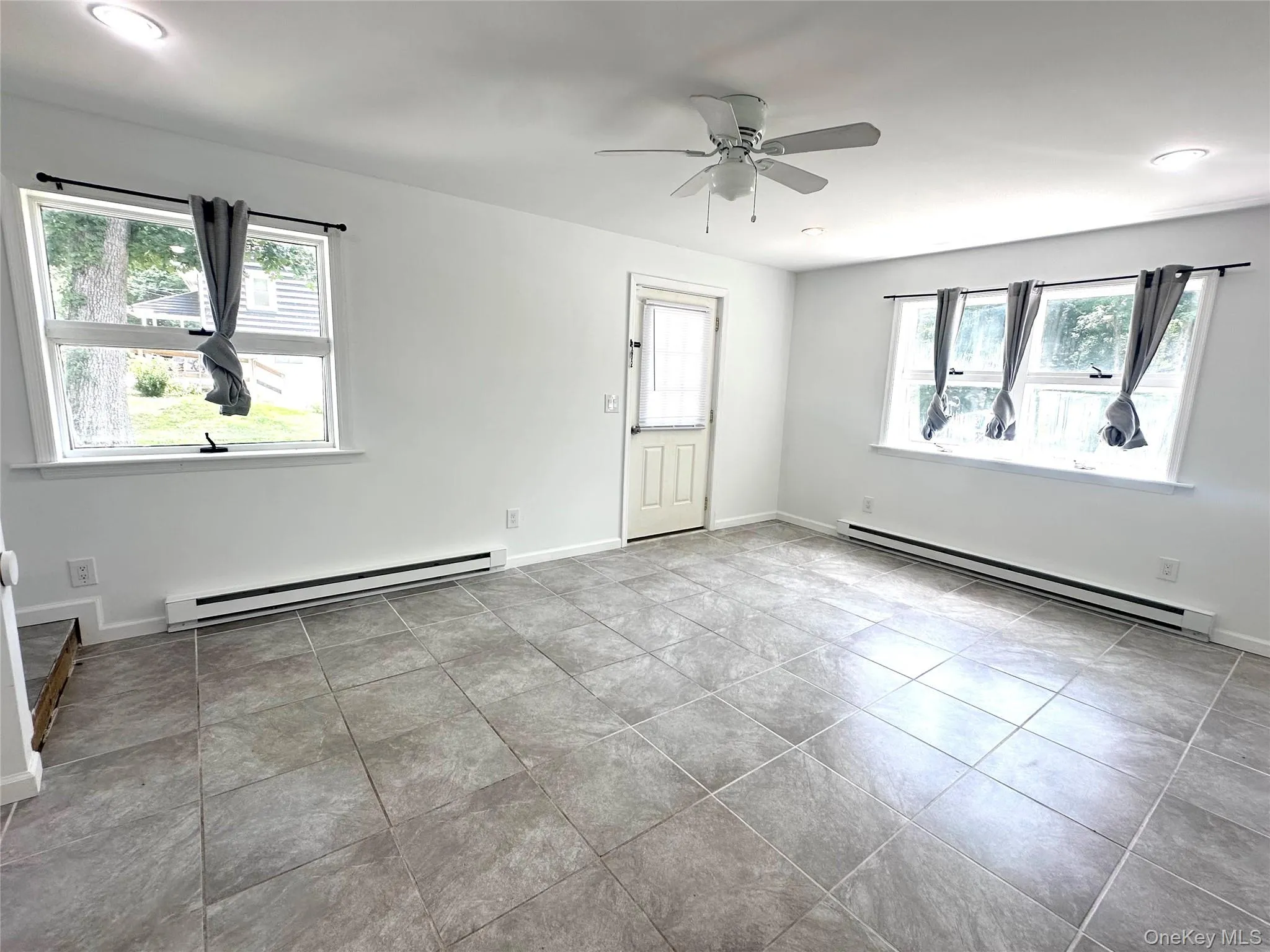 Both lower level rooms walk-out to the garden. Both lower level rooms walk-out to the garden.
