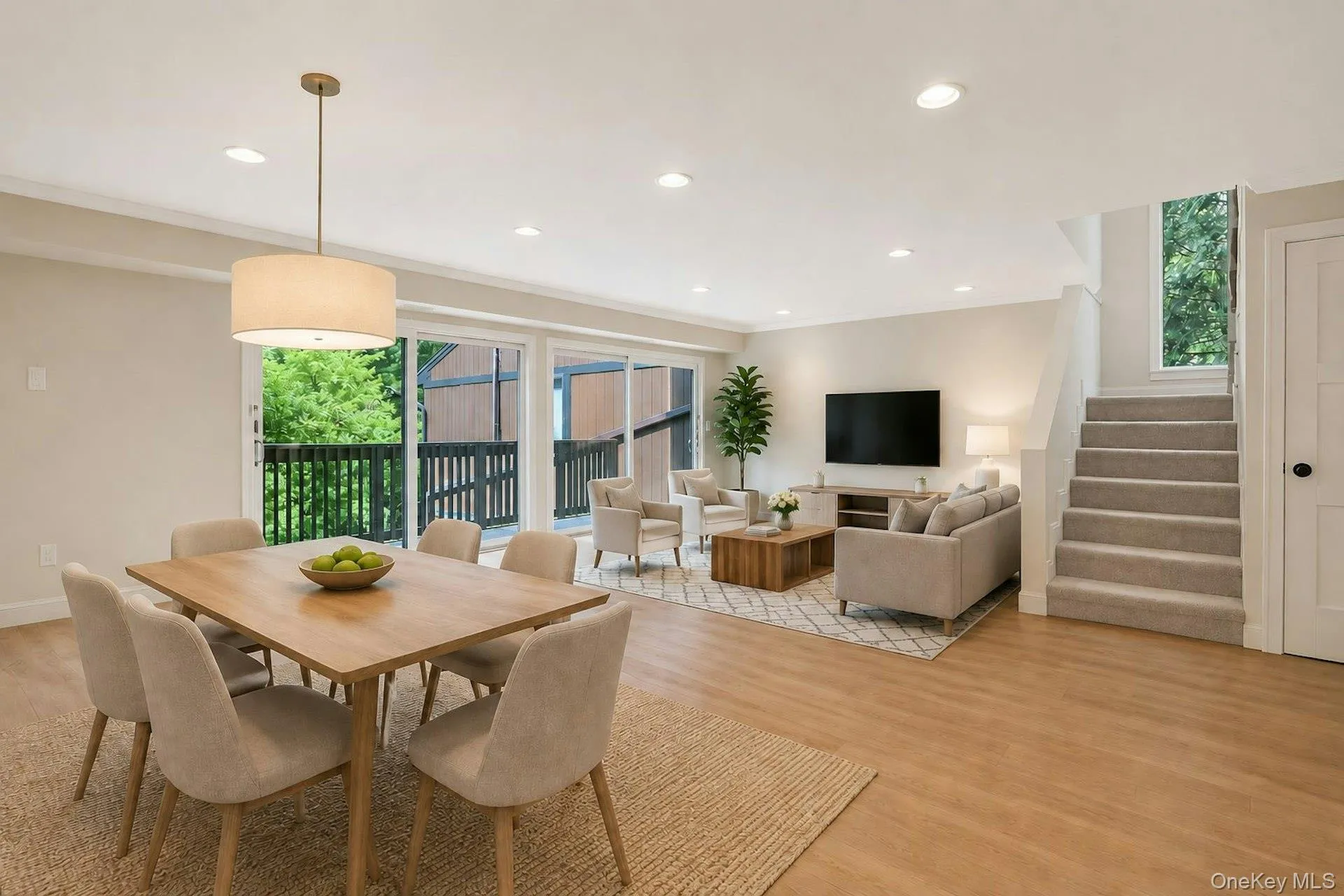 Virtually Staged - open concept living space with access to deck Virtually Staged - open concept living space with access to deck