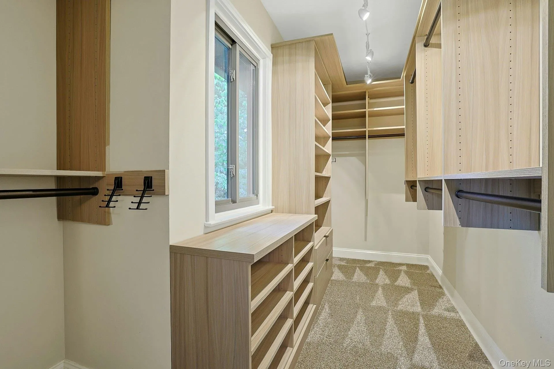 Inside the primary bedroom walk-in closet Inside the primary bedroom walk-in closet