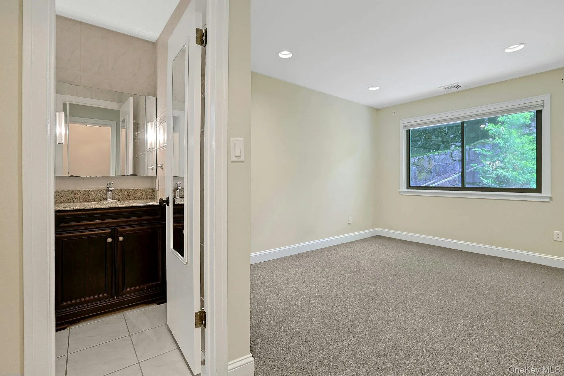 Den with halfbathroom perfect for guests, home office, TV room Den with halfbathroom perfect for guests, home office, TV room