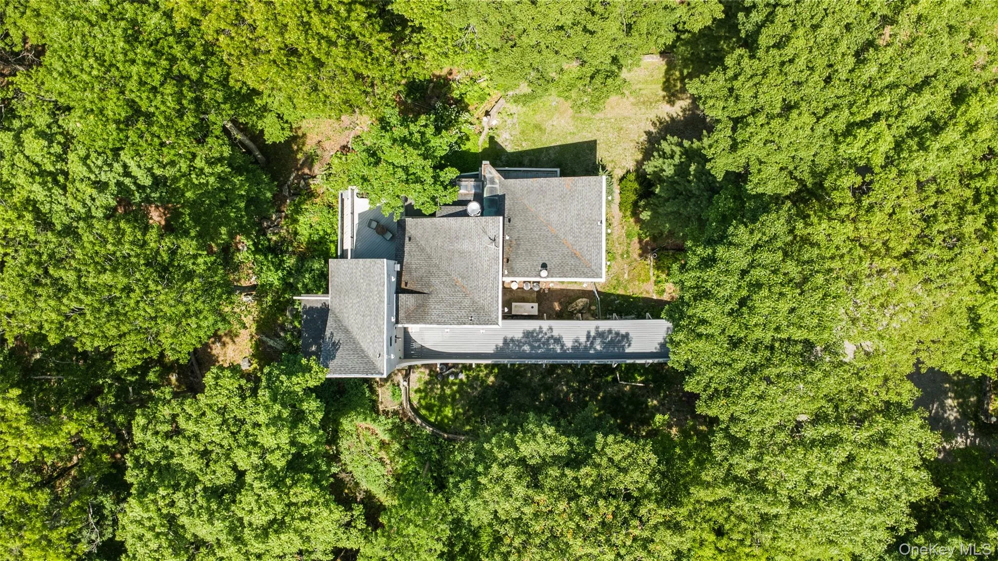 A rare aerial perspective of a truly unique estate, set on 6 private acres and surrounded by 30 + acres of protected natural beauty. From above, the home’s impressive scale, distinctive design, and extraordinary setting come into full view, with reservoirs nearby and a remarkable sense of peace, privacy, and seclusion in every direction. A rare aerial perspective of a truly unique estate, set on 6 private acres and surrounded by 30 + acres of protected natural beauty. From above, the home’s impressive scale, distinctive design, and extraordinary setting come into full view, with reservoirs nearby and a remarkable sense of peace, privacy, and seclusion in every direction.