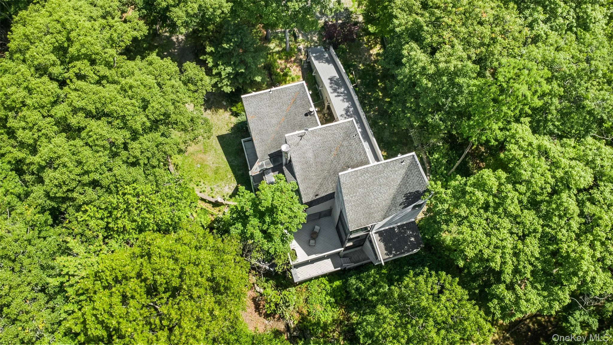 Aerial perspective of a truly unique estate, set on 6 private acres and surrounded by 30 + acres of protected natural beauty. From above, the home’s impressive scale, distinctive design, and extraordinary setting come into full view, with reservoirs nearby and a remarkable sense of peace, privacy, and seclusion in every direction. Aerial perspective of a truly unique estate, set on 6 private acres and surrounded by 30 + acres of protected natural beauty. From above, the home’s impressive scale, distinctive design, and extraordinary setting come into full view, with reservoirs nearby and a remarkable sense of peace, privacy, and seclusion in every direction.