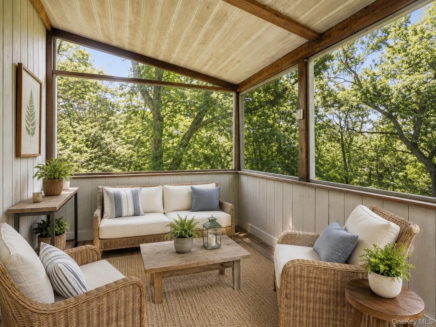 A charming 3-season room extends the living space and offers serene views of the surrounding wooded acreage. Tucked away with exceptional privacy, this inviting space is ideal for relaxing, entertaining, or simply enjoying the peaceful natural setting. A charming 3-season room extends the living space and offers serene views of the surrounding wooded acreage. Tucked away with exceptional privacy, this inviting space is ideal for relaxing, entertaining, or simply enjoying the peaceful natural setting.