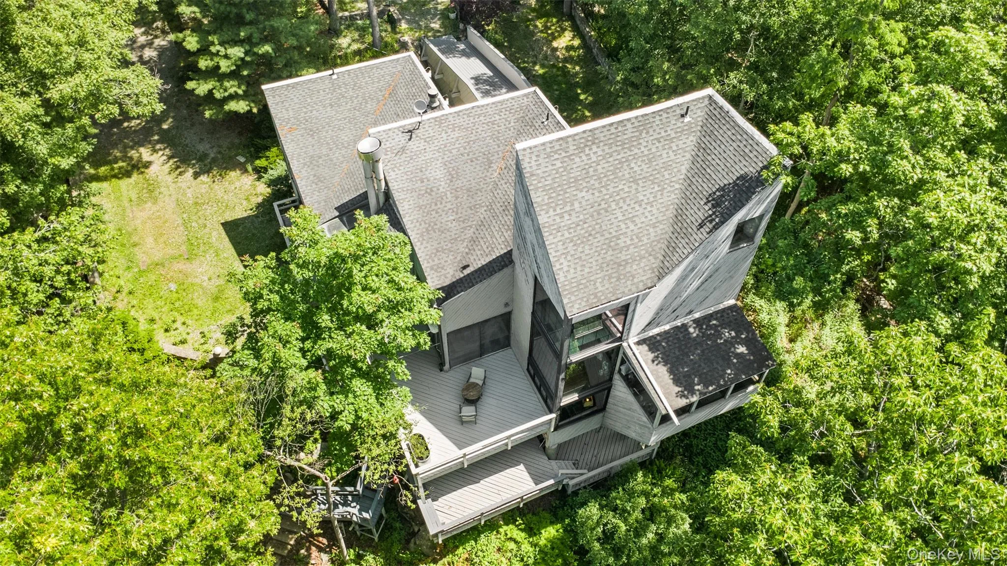 A rare aerial perspective of a truly unique estate, set on 6 private acres and surrounded by 30 + acres of protected natural beauty. From above, the home’s impressive scale, distinctive design, and extraordinary setting come into full view, with reservoirs nearby and a remarkable sense of peace, privacy, and seclusion in every direction. A rare aerial perspective of a truly unique estate, set on 6 private acres and surrounded by 30 + acres of protected natural beauty. From above, the home’s impressive scale, distinctive design, and extraordinary setting come into full view, with reservoirs nearby and a remarkable sense of peace, privacy, and seclusion in every direction.