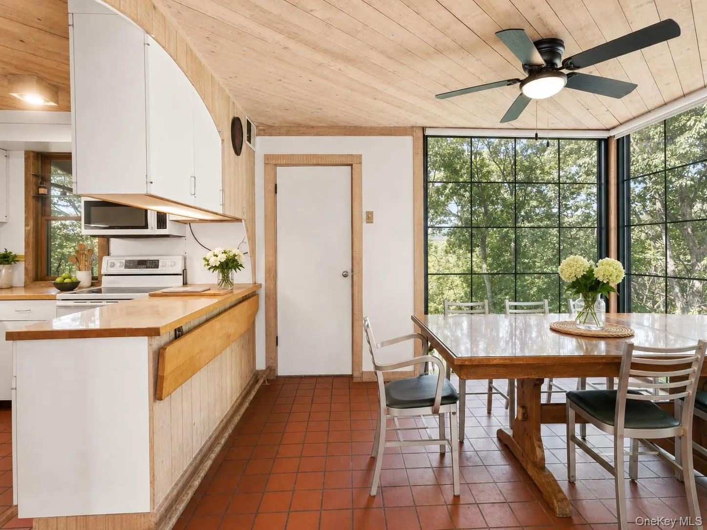 Open Kitchen to Breakfast area with floor to ceiling windows with tons of natural light Open Kitchen to Breakfast area with floor to ceiling windows with tons of natural light