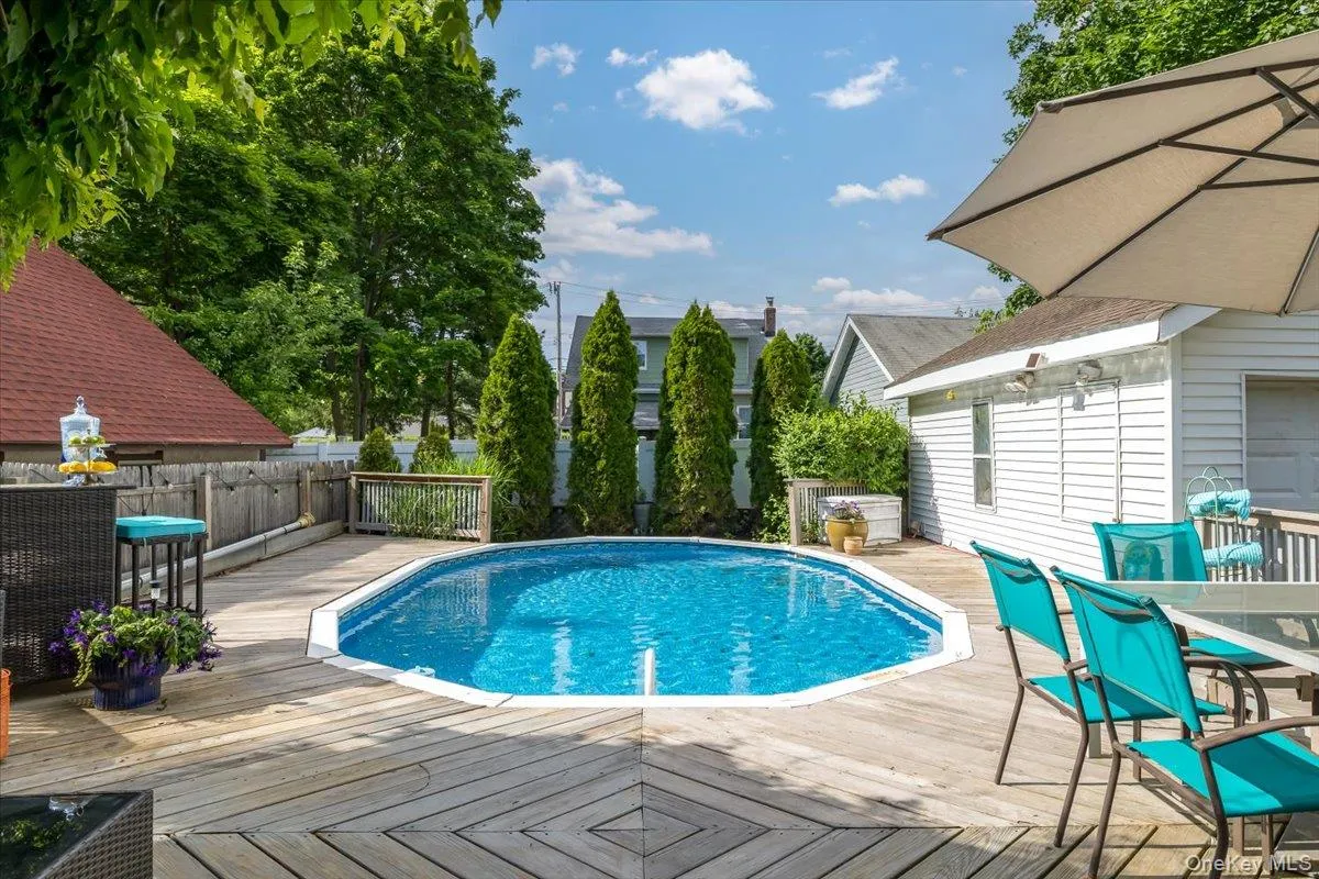 Above ground saltwater pool with wrap around deck Above ground saltwater pool with wrap around deck