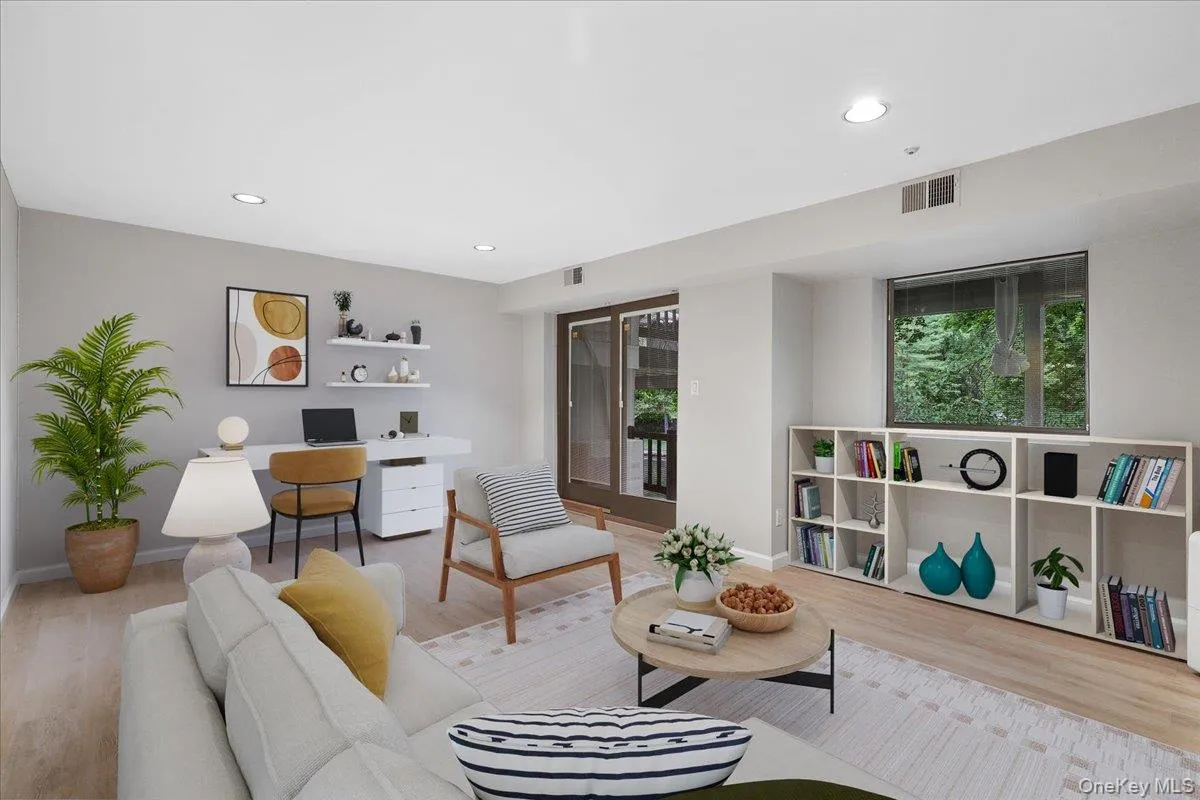Finished walk-out lower level with sliding glass doors to the outdoors. Finished walk-out lower level with sliding glass doors to the outdoors.