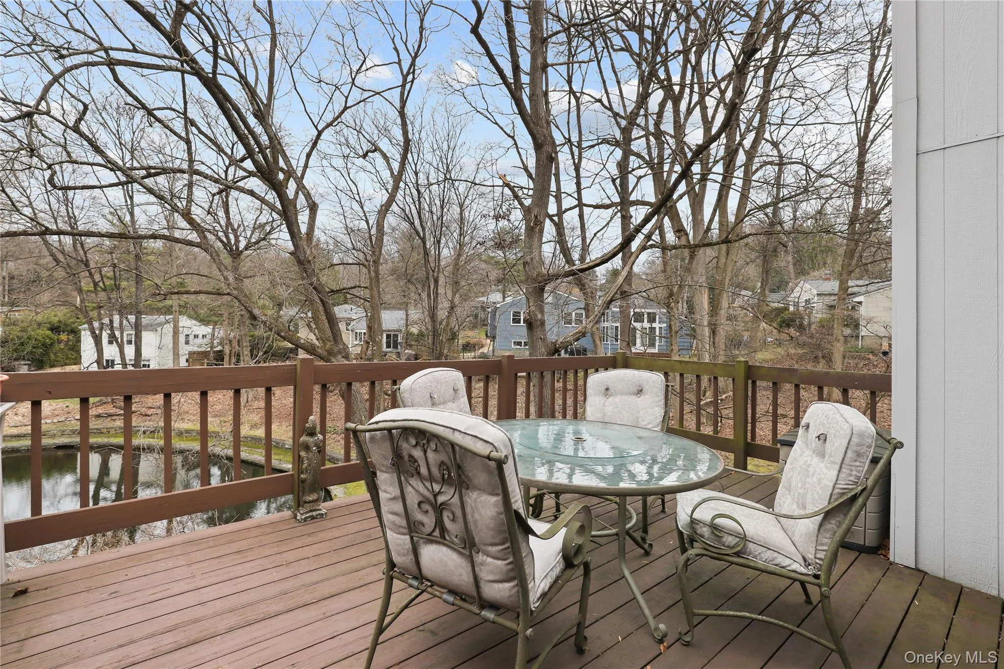 Private deck overlooking the tranquil lake and surrounding landscape. Private deck overlooking the tranquil lake and surrounding landscape.