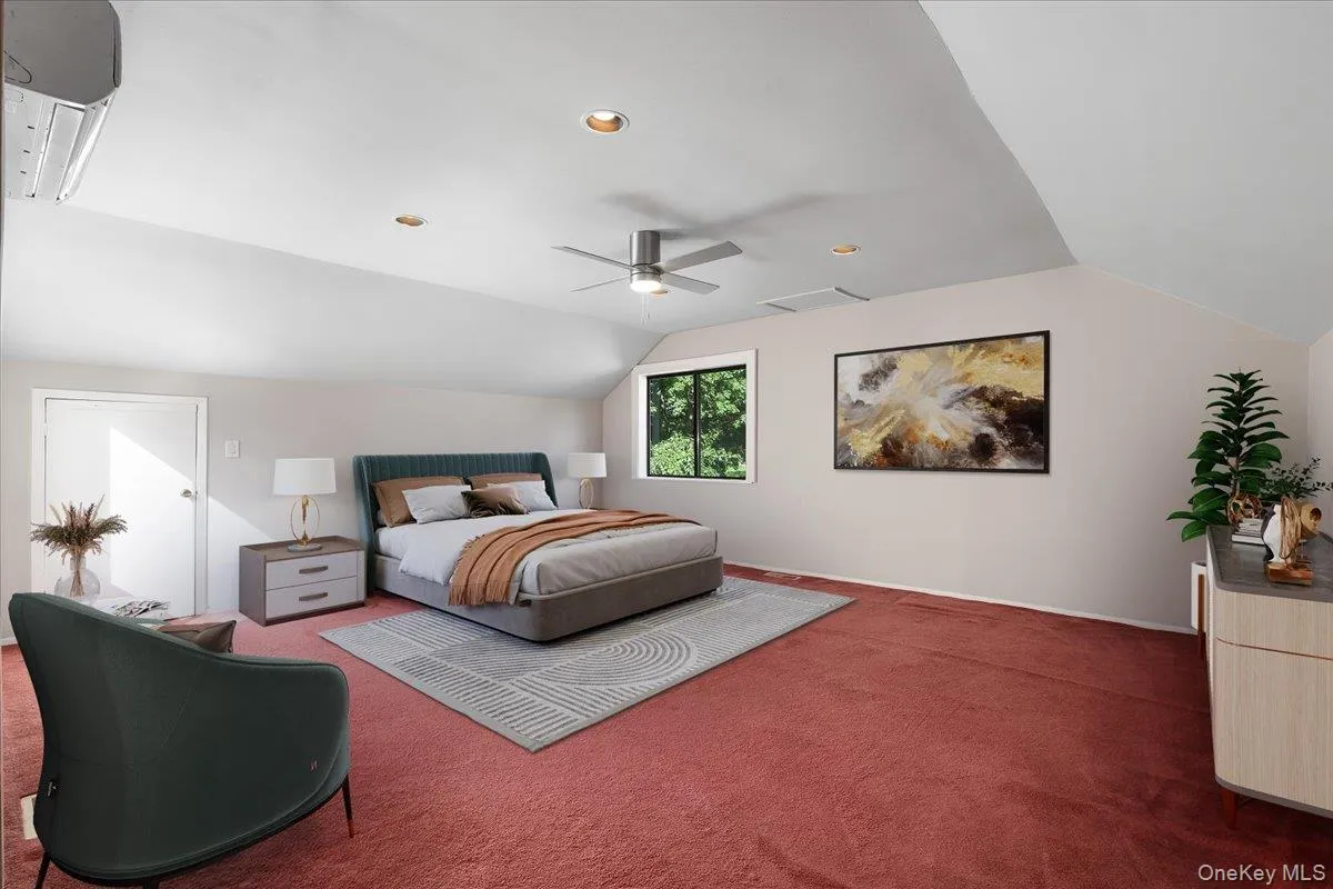 Expansive upper-level flex room, ideal as a guest suite, recreation room, studio, or home office. Expansive upper-level flex room, ideal as a guest suite, recreation room, studio, or home office.