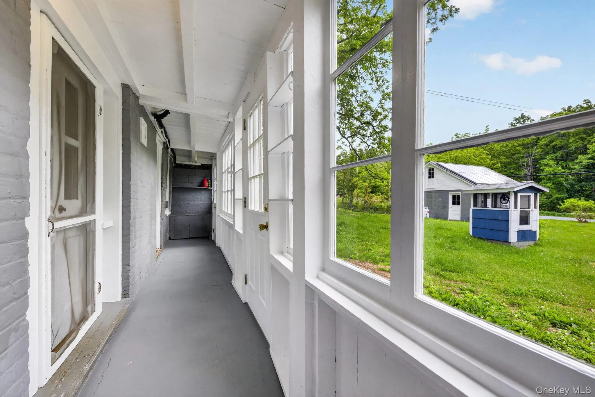 Lower Level Enclosed Porch Lower Level Enclosed Porch