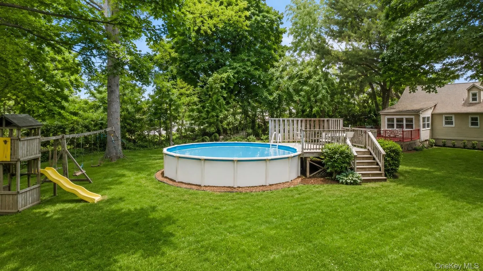 Private level backyard, Complete with an above-ground pool, this private outdoor oasis is perfect for entertaining, relaxing, gardening, or cooling off on hot summer days. Private level backyard, Complete with an above-ground pool, this private outdoor oasis is perfect for entertaining, relaxing, gardening, or cooling off on hot summer days.
