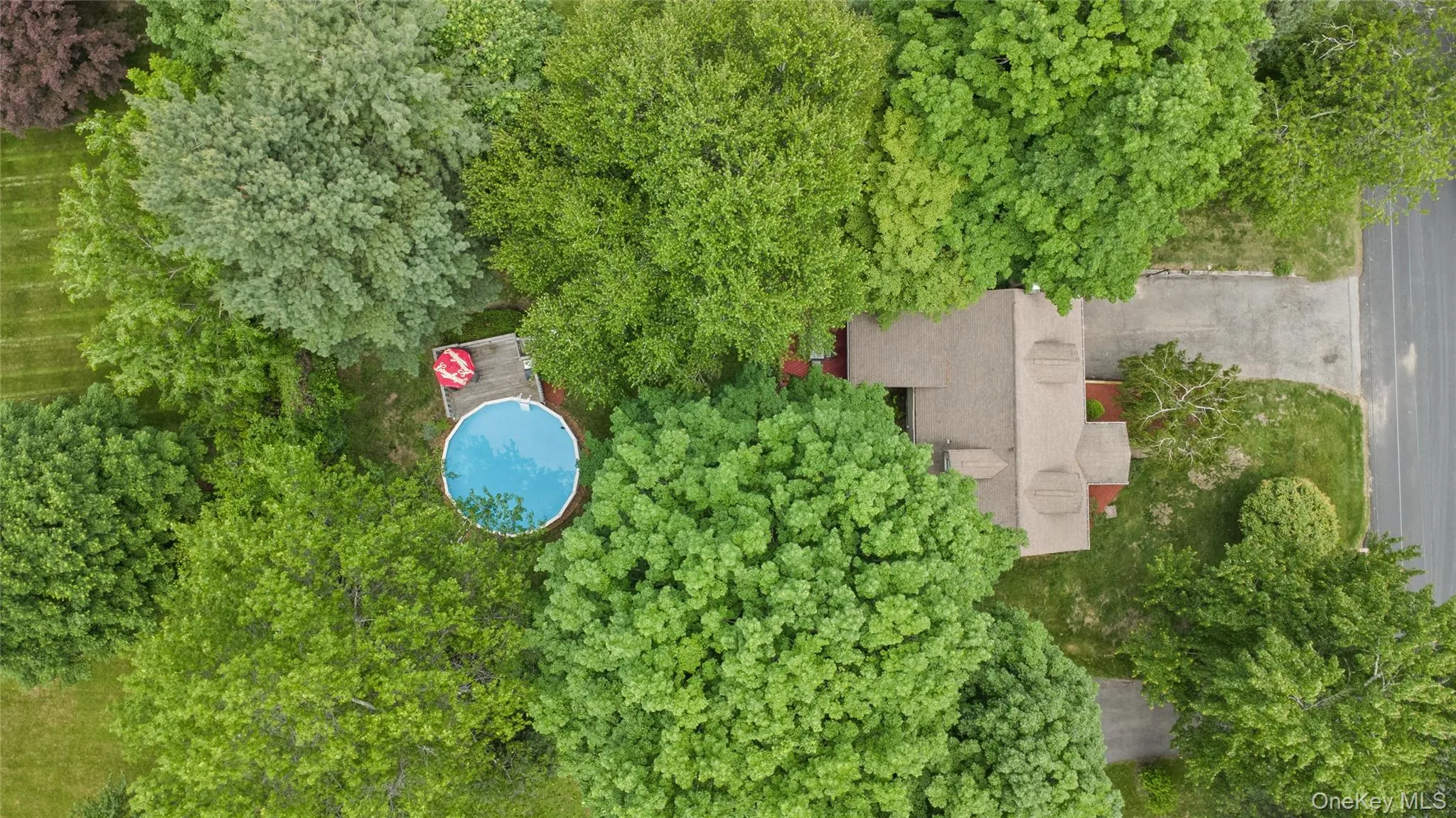 Aerial- view- The expansive yard provides plenty of space for play, gatherings, and enjoying the outdoors. Aerial- view- The expansive yard provides plenty of space for play, gatherings, and enjoying the outdoors.