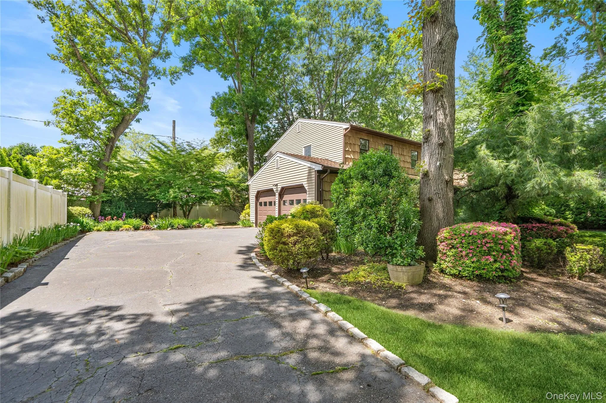 Expansive driveway with two-car garage Expansive driveway with two-car garage